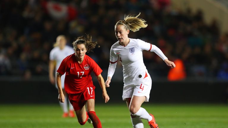 Keira Walsh of England is chased by Jessie Fleming of Canada during the International Friendly between England Women and Canada Women at The Academy Stadium on April 05, 2019 in Manchester, England