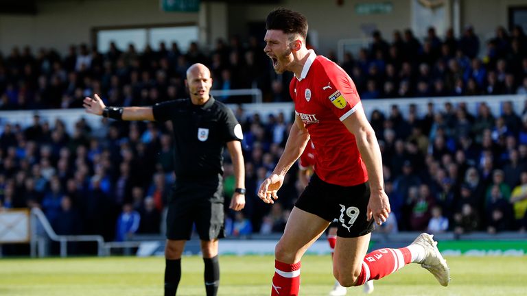 Kieffer Moore celebrates scoring for Barnsley against Bristol Rovers in Sky Bet League One
