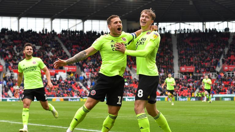 Sheffield United's Kieran Dowell (right) celebrates scoring his side's first goal of the game with Billy Sharp