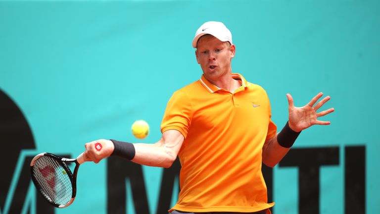 Kyle Edmund of Great Britain returns the ball in his match against Fabio Fognini of Italy during day four of the Mutua Madrid Open at La Caja Magica on May 07, 2019 in Madrid, Spain