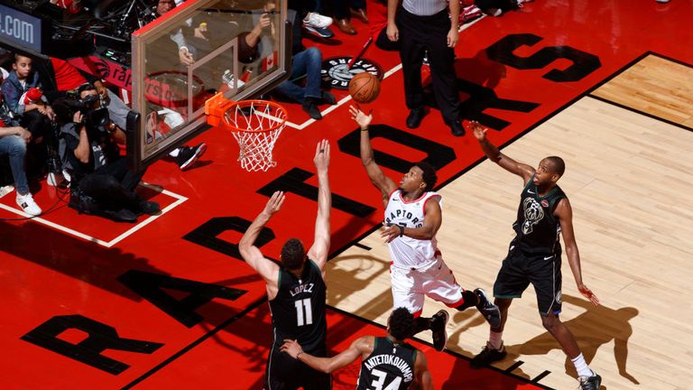 Kyle Lowry of the Toronto Raptors goes to the basket against the Milwaukee Bucks during Game Six of the Eastern Conference Finals