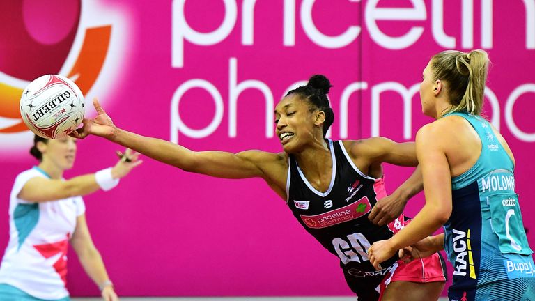 Layla Guscoth reaching out for an intercept for the Adelaide Thunderbirds