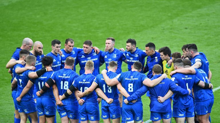 The Leinster players form a huddle on the St James' Park pitch