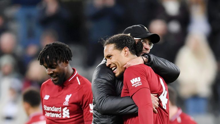 NEWCASTLE UPON TYNE, ENGLAND - MAY 04: Jurgen Klopp, Manager of Liverpool celebrates victory with Virgil van Dijk of Liverpool after the Premier League match between Newcastle United and Liverpool FC at St. James Park on May 04, 2019 in Newcastle upon Tyne, United Kingdom. (Photo by Laurence Griffiths/Getty Images)