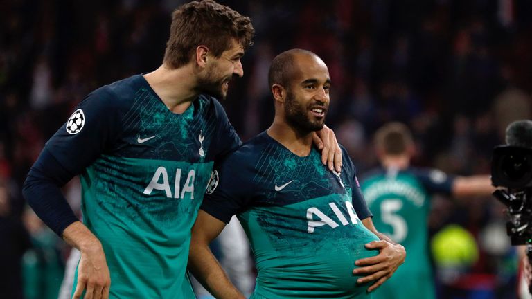 Match-winner Lucas Moura and Fernando Llorente after the final whistle in Amsterdam