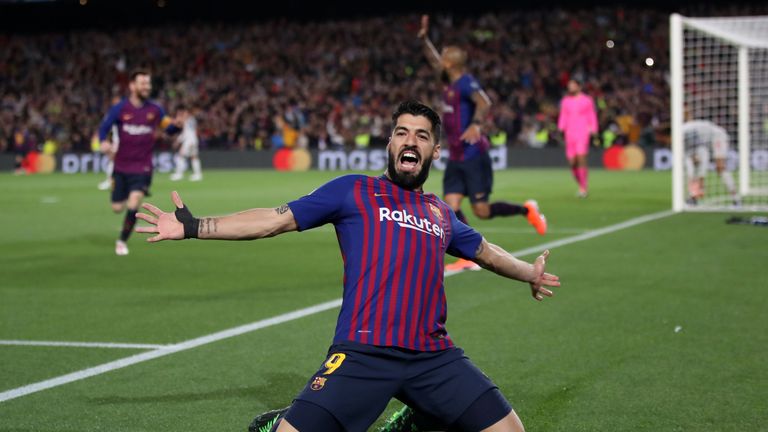 Barcelona's Luis Suarez celebrates scoring against Liverpool