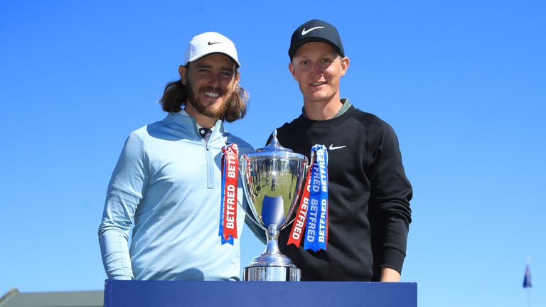 Marcus Kinhult with the British Masters trophy and tournament-host Tommy Fleetwood
