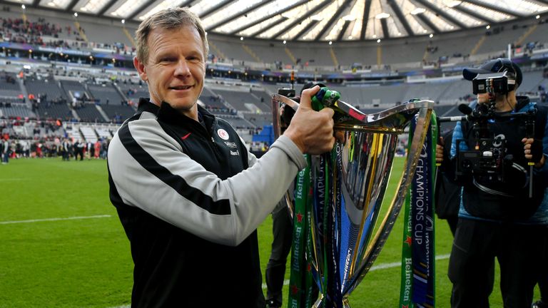 Mark McCall proudly holds the Heineken Champions Cup trophy