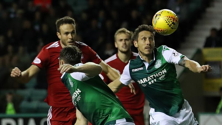 EDINBURGH, SCOTLAND - SEPTEMBER 25: Mark Milligan of Hibernian makes a clearance during the Betfred Scottish League Cup Quarter Final match between Hibernian and Aberdeen on September 25, 2018 in Edinburgh, Scotland. (Photo by Ian MacNicol/Getty Images)