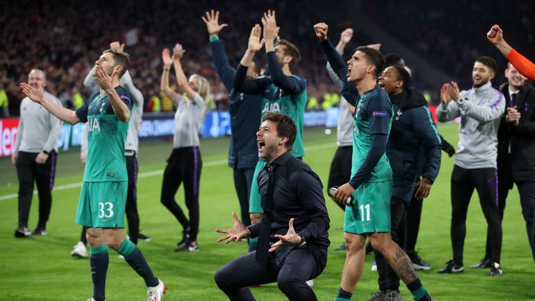 Tottenham Hotspur manager Mauricio Pochettino celebrates with his player and backroom staff after reaching the Champions League final