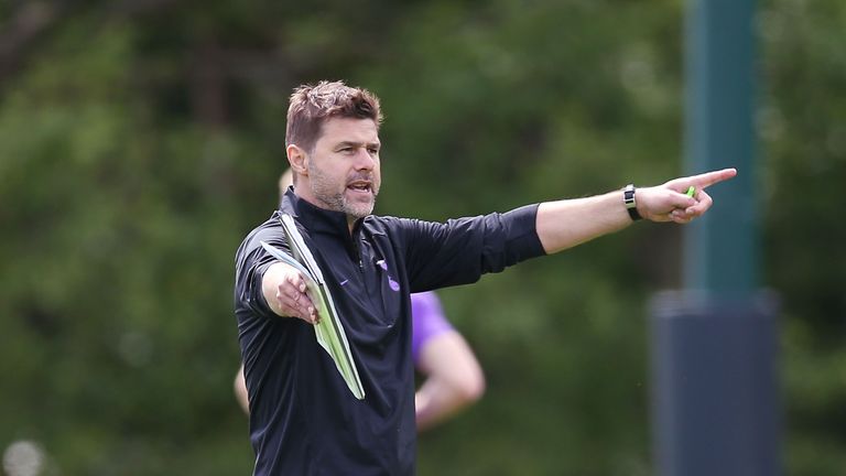 Mauricio Pochettino gives instructions during a training session