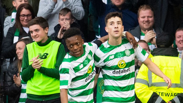 Celtic's Mikey Johnston (right) celebrates his second goal with debutant Karamoko Dembele
