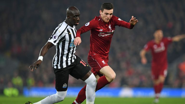 Mohamed Diame vies with Andrew Robertson during their Anfield encounter