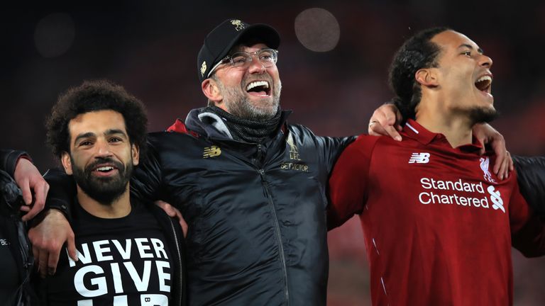 Mohamed Salah, Jurgen Klopp and Virgil van Dijk celebrate after Liverpool's 4-0 win over Barcelona