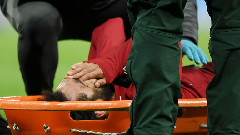 Mohamed Salah was carried off on a stretcher in the second half at St James' Park
