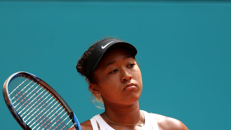 Naomi Osaka of Japan looks on in her match against Belinda Bencic of Switzerland during day six of the Mutua Madrid Open at La Caja Magica on May 09, 2019 in Madrid, Spain. 