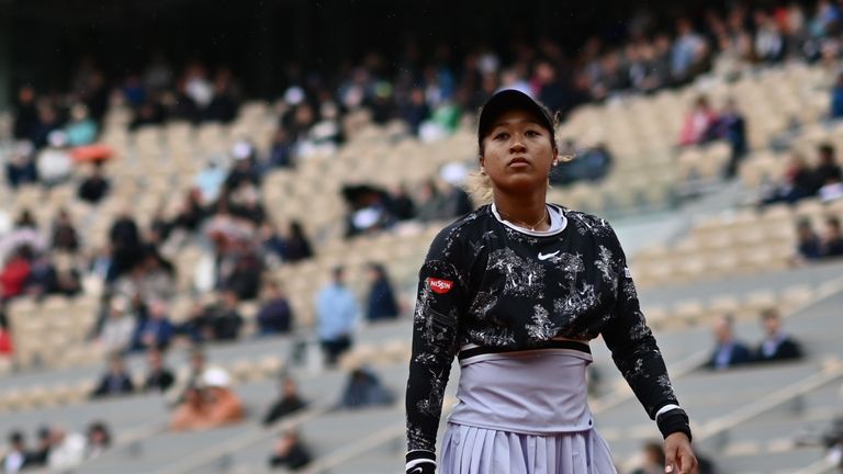 Japan's Naomi Osaka reacts during her women's singles first round match against Slovakia's Anna Karolina Schmiedlova, on day three of The Roland Garros 2019 French Open tennis tournament in Paris on May 28, 2019.