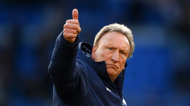 Cardiff manager Neil Warnock puts on a brave face as he thanks the supporters