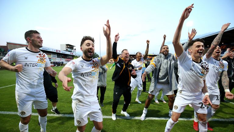 Newport County players and manager Michael Flynn celebrate their win during the Sky Bet League Two Play-off, Semi Final Second Leg match at the One Call Stadium, Mansfield.