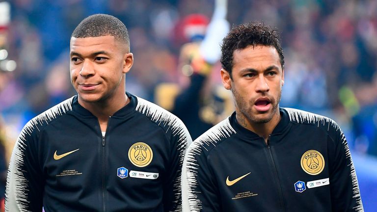 Paris Saint-Germain's French forward Kylian Mbappe (L) and Brazilian forward Neymar react as stand prior to the start of the French Cup final football match between Rennes (SRFC) and Paris Saint-Germain (PSG), on April 27, 2019 at the Stade de France in Saint-Denis, outside Paris. 