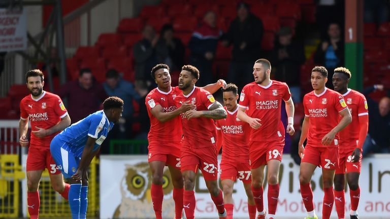 Kaiyne Woolery celebrates scoring for Swindon as Notts County were relegated