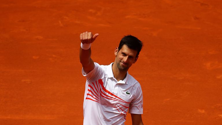 Novak Djokovic of Serbia celebrates defeating Taylor Fritz of USA during day four of the Mutua Madrid Open at La Caja Magica on May 07, 2019 in Madrid, Spain