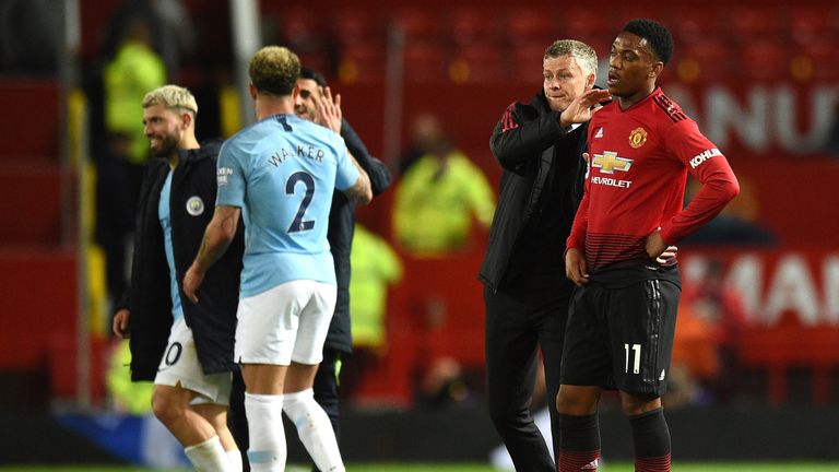 Ole Gunnar Solskjaer consoles Anthony Martial after the 2-0 defeat to Manchester City at Old Trafford on April 24, 2019