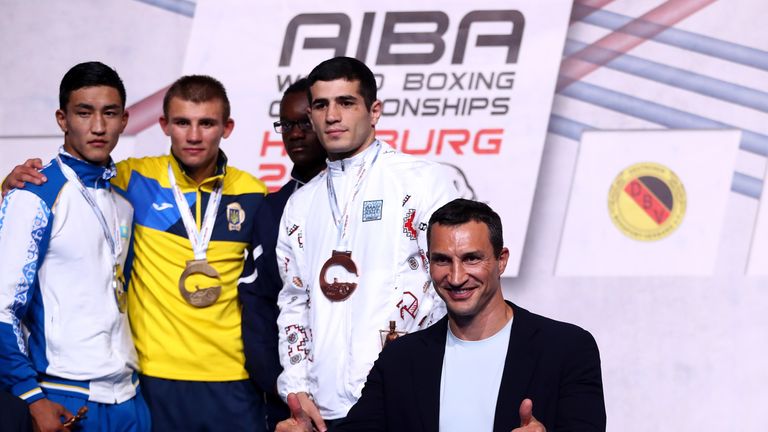 Abilkhan Amankul (L) of Kazakhstan and Oleksandr Khyzhniak of Ukraine fight in the Men's middle during the final of the AIBA World Boxing Championships Hamburg 2017 at Sporthalle Hamburg on September 2, 2017 in Hamburg, Germany.