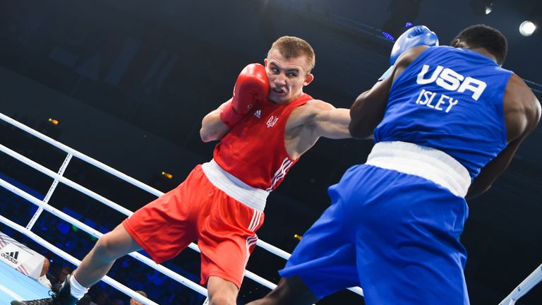 Oleksandr Khyzhniak in action with Troy Isley during the Amateur Boxing World Championship in 2017