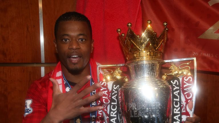 Patrice Evra at Manchester United, Premier League trophy at Old Trafford on May 12, 2013 in Manchester, England.