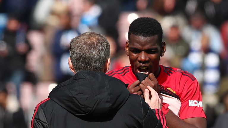 Paul Pogba with Ole Gunnar Solskjaer following Manchester United's 1-1 draw with Huddersfield Town at John Smith's Stadium