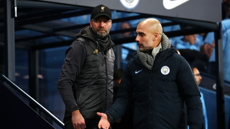 Jurgen Klopp and Pep Guardiola during the Premier League match between Manchester City and Liverpool FC at the Etihad Stadium on January 3, 2019 in Manchester, United Kingdom.