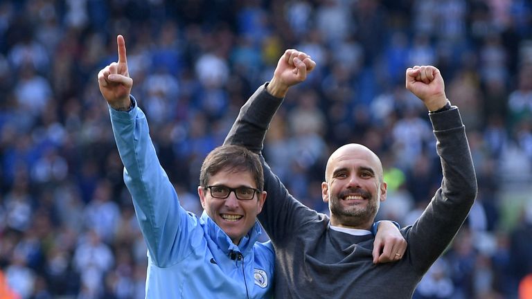 Pep Guardiola celebrates winning the Premier League title after the 4-1 win over Brighton