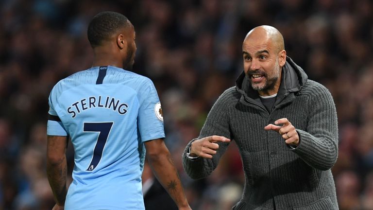 Pep Guardiola talks to Raheem Sterling during the game vs Leicester City