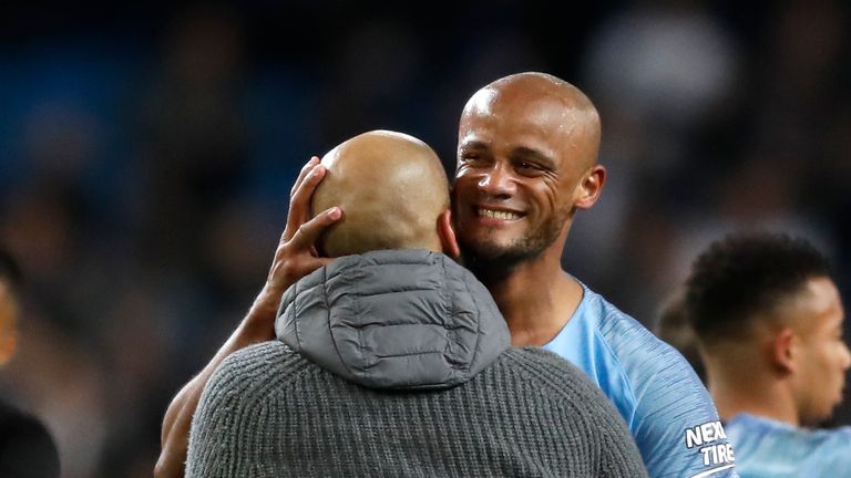 Pep Guardiola embraces Vincent Kompany after the 1-0 win over Leicester City