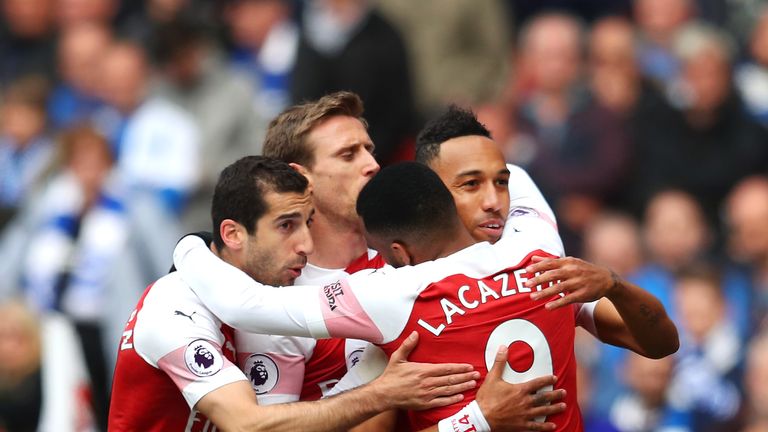 Pierre-Emerick Aubameyang celebrates with team-mates after giving Arsenal an early lead