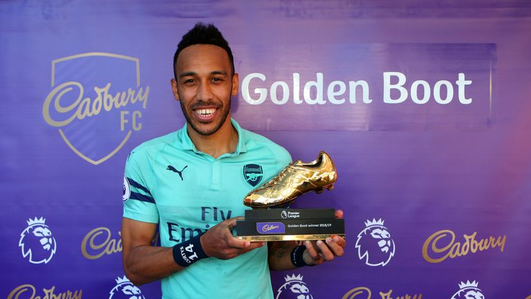Pierre-Emerick Aubameyang poses with the Premier League golden boot award for the 2018/19 season