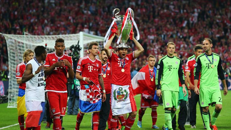 Claudio Pizarro lifting the Champions League in 2013 after Bayern Munich's victory over Borussia Dortmund at Wembley Stadium.
