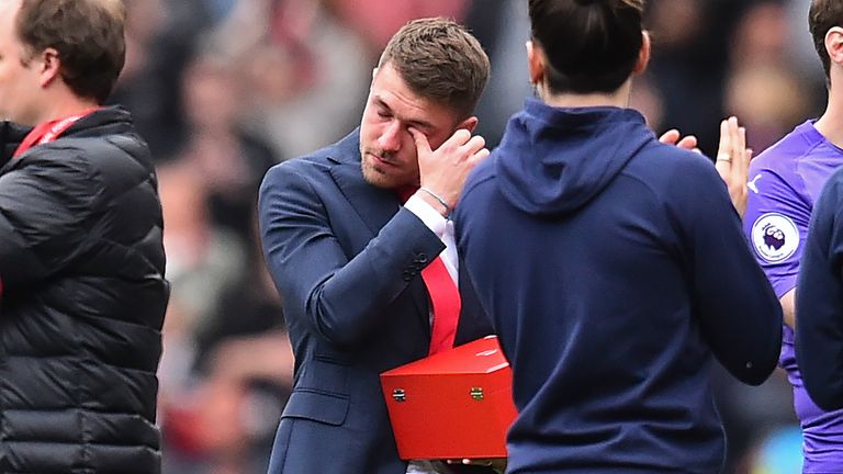 Arsenal's Welsh midfielder Aaron Ramsey reacts at a presentation ceremony on the pitch after the English Premier League football match between Arsenal and Brighton and Hove Albion at the Emirates Stadium in London on May 5, 2019.