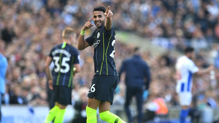 Riyad Mahrez of Manchester City celebrates after scoring his team&#39;s third goal