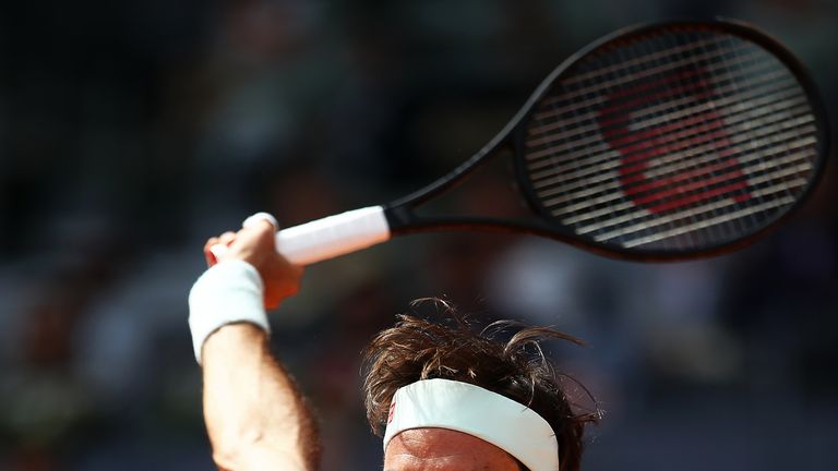 Roger Federer of Switzerland in action against Gael Monfils of France during day six of the Mutua Madrid Open at La Caja Magica on May 09, 2019 in Madrid, Spain