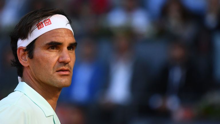 Switzerland's Roger Federer reacts as he plays against Austria's Dominic Thiem during their ATP Madrid Open quarter-final tennis match at the Caja Magica in Madrid on May 10, 2019