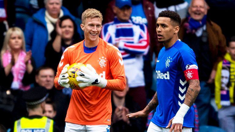 Ross McCrorie smiles with the ball in his hands after his cameo as a goalkeeper