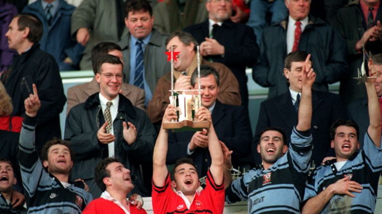 Thomas Castaignede lifts the Heineken Cup trophy as Toulouse won the first European final 

