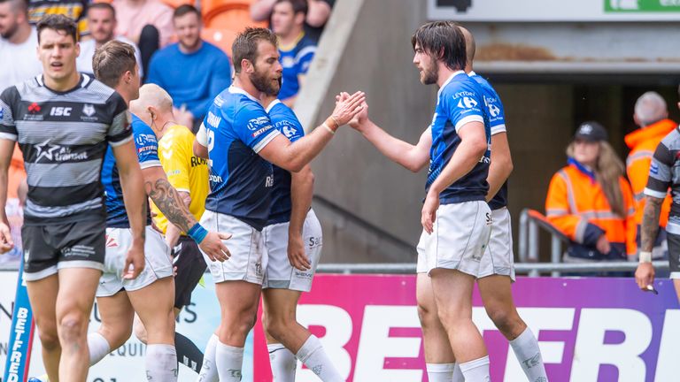 Toulouse's Joe Bretherton (right) is congratulated after scoring a try against Toronto