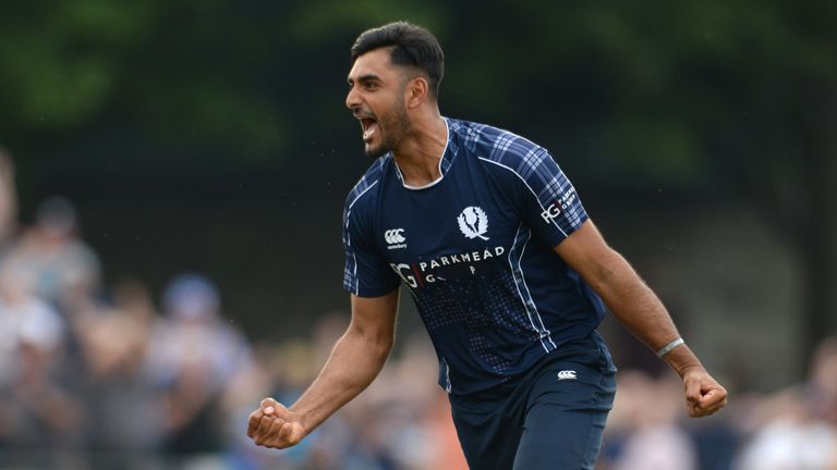 EDINBURGH, SCOTLAND - JUNE 10 : Safyaan Sharif celebrates after taking the final wicket of Mark Wood as Scotland won the One-Day International match  between Scotland and England at Grange cricket club ground on June 10, 2018 in Edinburgh, Scotland. (Photo by Philip Brown/Getty Images) *** Local Caption *** Safyaan Sharif
