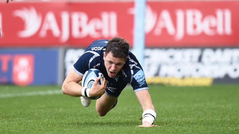 Sale's Sam James dives over to score a try