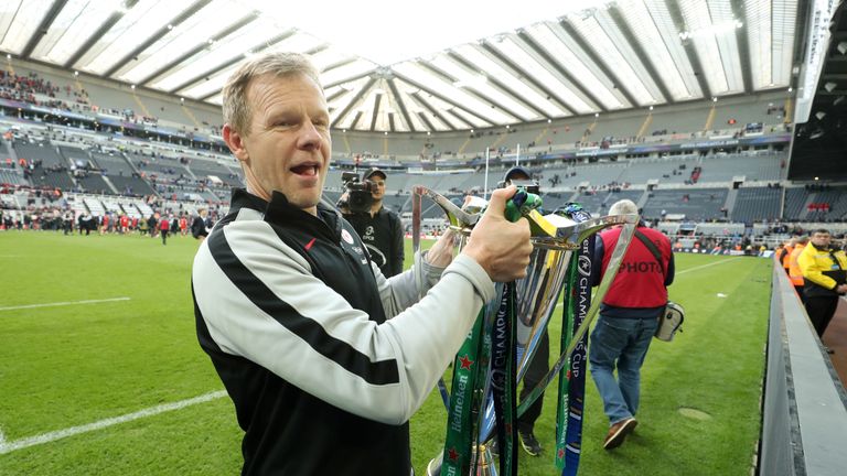 NEWCASTLE UPON TYNE, ENGLAND - MAY 11: Mark McCall, Director of Rugby of Saracens lifts the Champions Cup trophy following the Champions Cup Final match between Saracens and Leinster at St. James Park on May 11, 2019 in Newcastle upon Tyne, United Kingdom. (Photo by David Rogers/Getty Images)