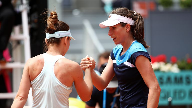 Simona Halep of Romania is congratulated by Johanna Konta of Great Britain after her win during day four of the Mutua Madrid Open at La Caja Magica on May 07, 2019 in Madrid, Spain. 