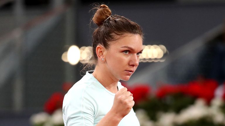 Simona Halep of Romania celebrates in her match against Viktoria Kuzmova of Slovakia during day five of the Mutua Madrid Open at La Caja Magica on May 08, 2019 in Madrid, Spain. 